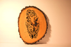 Owl cutout on tree round